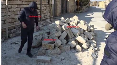 Suraxanıda hasarları sökən maskalı şəxslər peyda olub - Adil Əliyev bu şəxsləri tanıyırmı?- FOTO